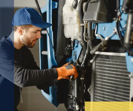 Maintenance worker fixing a machine