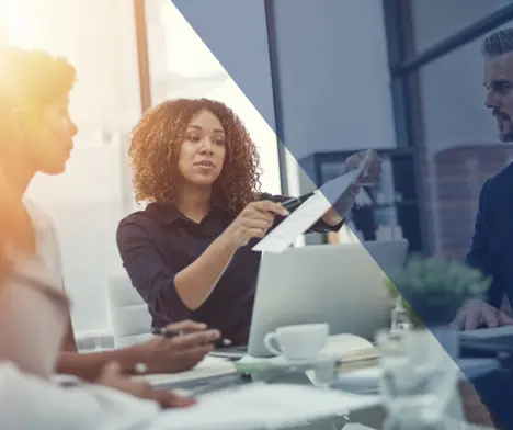Two women looking at data